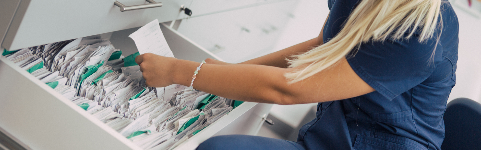 Medical worker with files